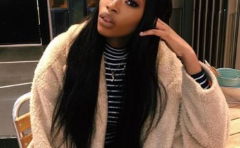 Uche Natori sitting down