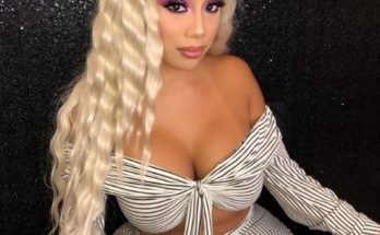 Bando Tine sitting down in a blonde hair